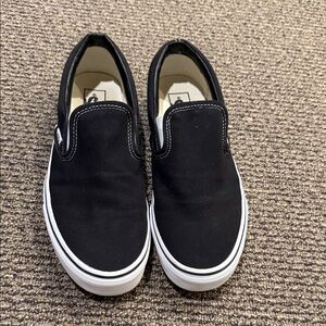 Vans Black and White Slip-On Sneakers